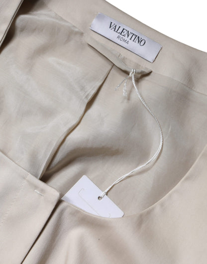 Valentino – Beigefarbene Blazerjacke aus Baumwolle mit langen Ärmeln und Rundhalsausschnitt
