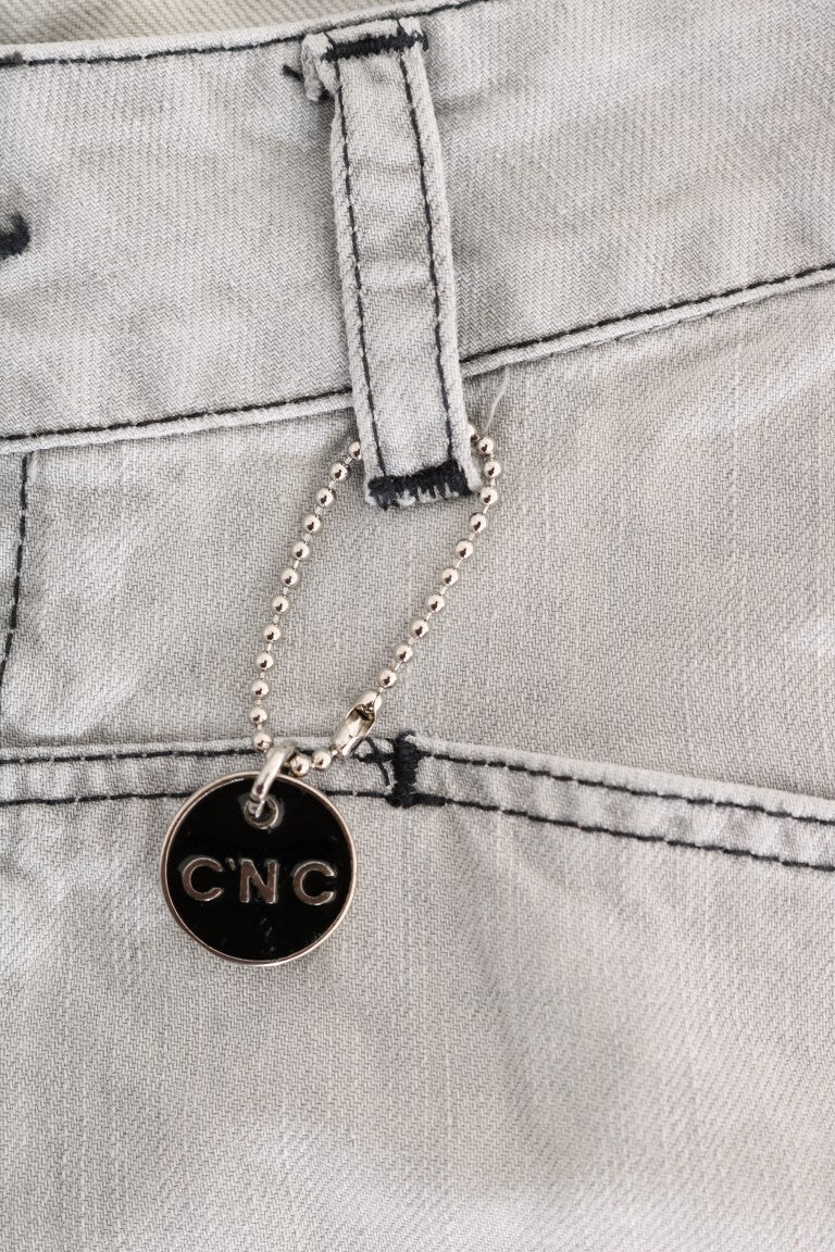 Costume National – Schmal geschnittene Jeans aus Baumwolle in Grau