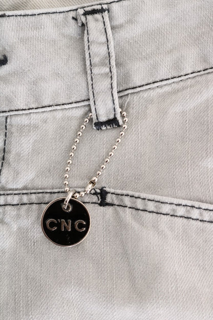 Costume National – Schmal geschnittene Jeans aus Baumwolle in Grau