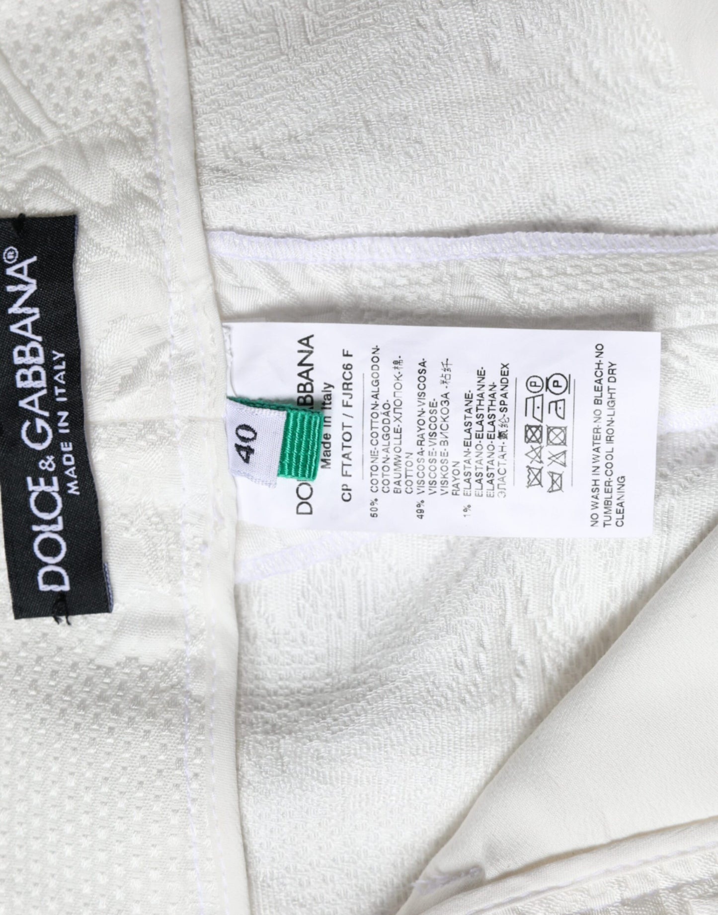 Dolce &amp; Gabbana – Weiße, kurze Hose aus Baumwollbrokat mit Blumenmuster