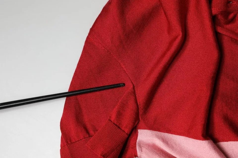 Dolce &amp; Gabbana – Rosafarbenes Pullover-Oberteil mit Ascot-Kragen und kurzen Ärmeln