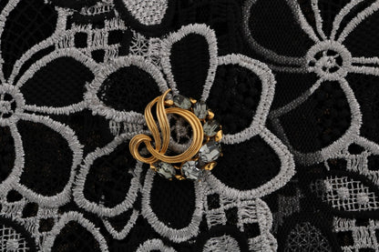 Dolce &amp; Gabbana – Rock aus geblümter Makramee-Spitze mit Kristallknöpfen