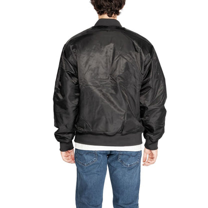 Calvin Klein Jeans – Schwarze Polyamidjacken und -mäntel