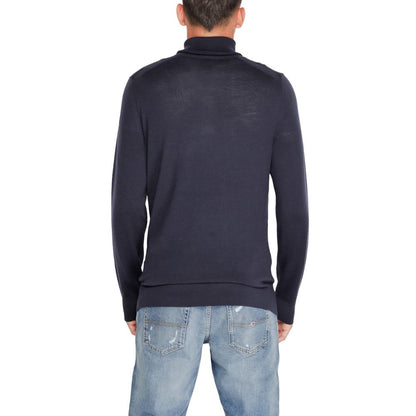 Calvin Klein – Blauer Rollkragenpullover aus Wolle