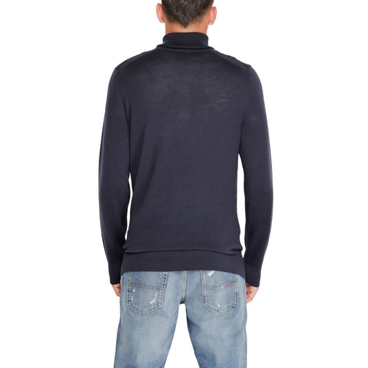 Calvin Klein – Blauer Rollkragenpullover aus Wolle