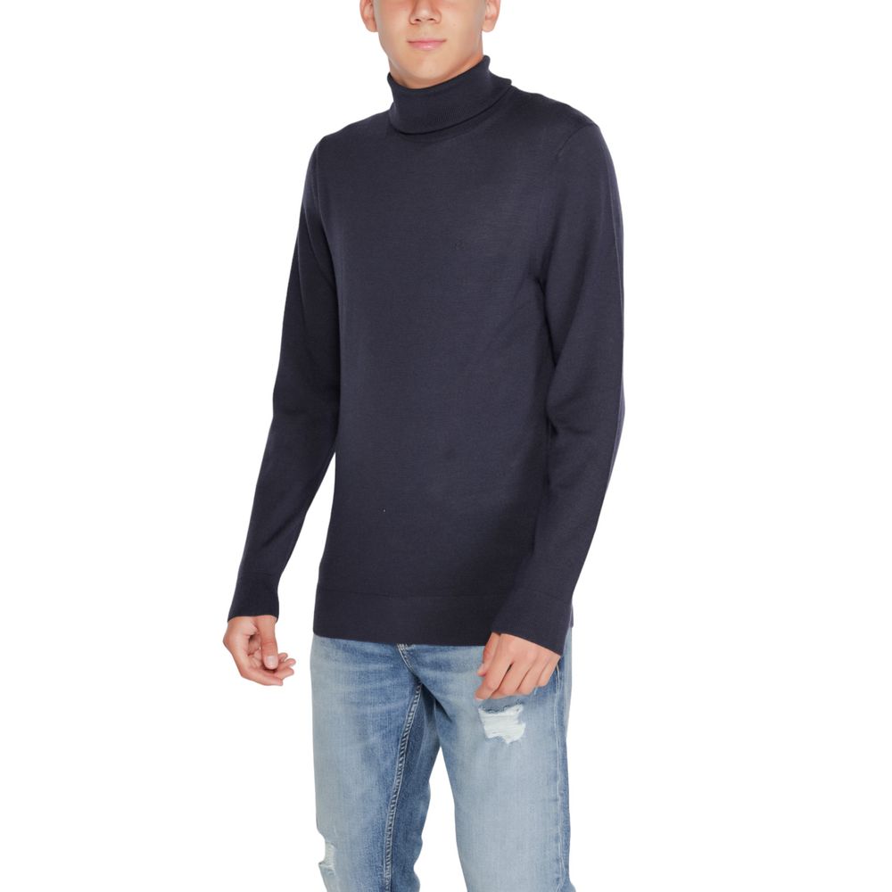 Calvin Klein – Blauer Rollkragenpullover aus Wolle