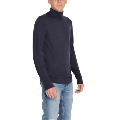 Calvin Klein – Blauer Rollkragenpullover aus Wolle