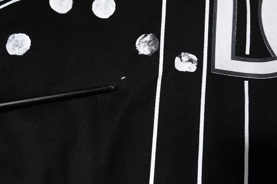 Dolce &amp; Gabbana – Schwarzes T-Shirt aus Baumwolle mit Polka Dots und Rundhalsausschnitt