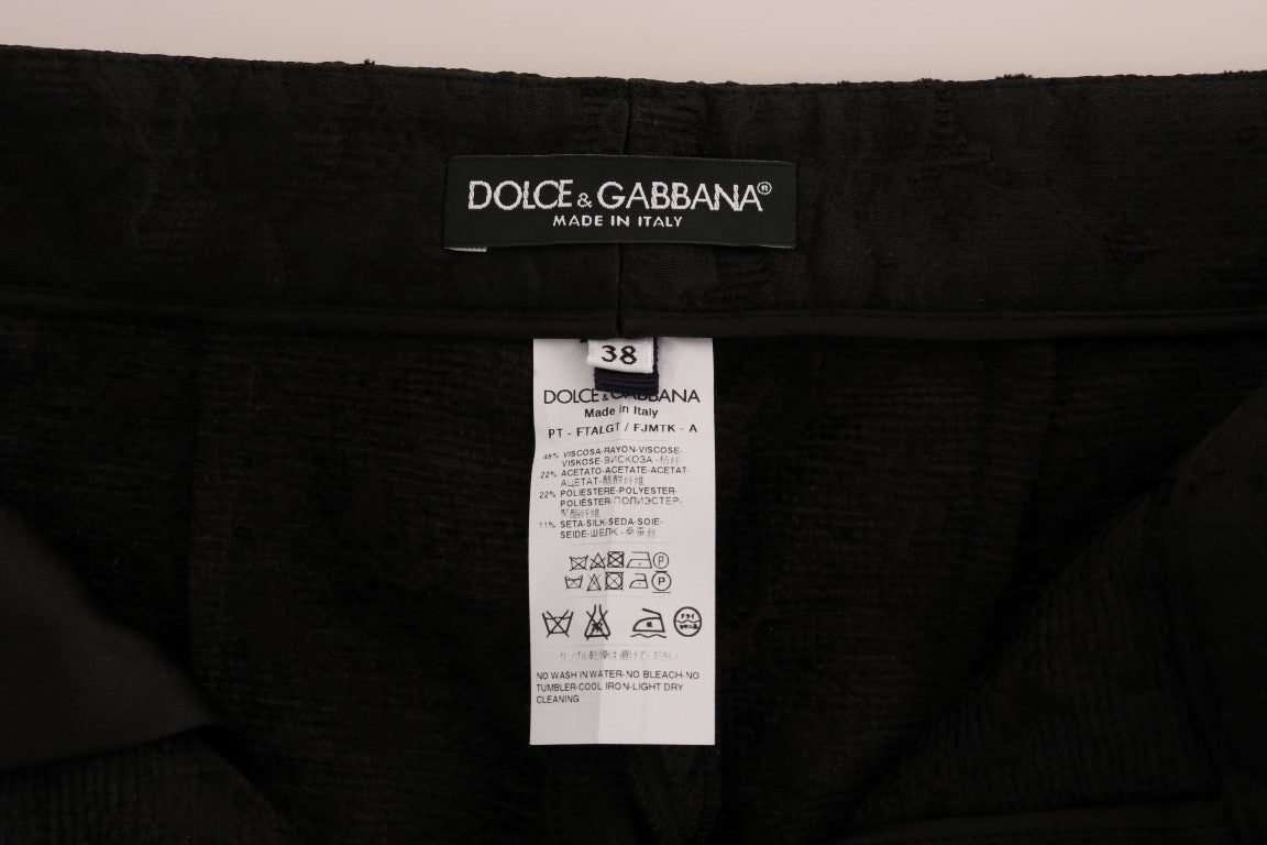 Dolce &amp; Gabbana – Schwarze Caprihose aus geblümtem Brokat