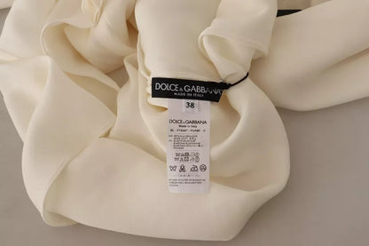 Dolce &amp; Gabbana Langärmliges Rollkragenoberteil aus Seide in gebrochenem Weiß