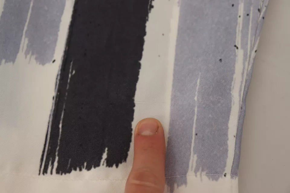 Dolce &amp; Gabbana Blau gestreifte Karottenhose aus Seide