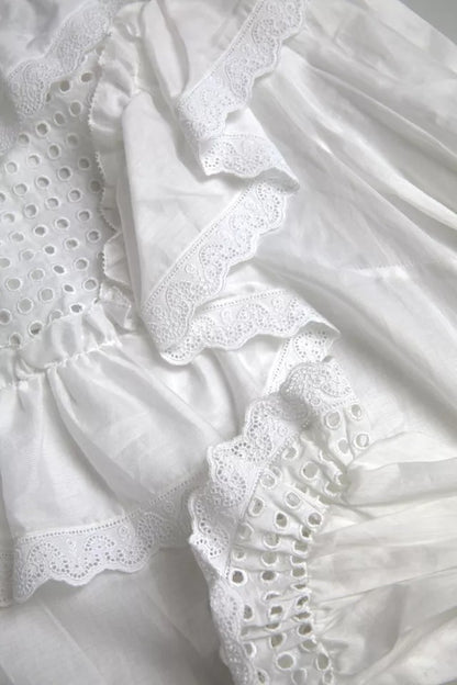 Dolce &amp; Gabbana, weiße Bluse mit Rollkragen und Spitzenbesatz aus Baumwolle