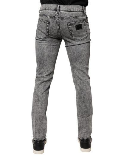Dolce &amp; Gabbana – Slim Fit-Jeans aus Baumwolle mit Logo-Schild in Grau