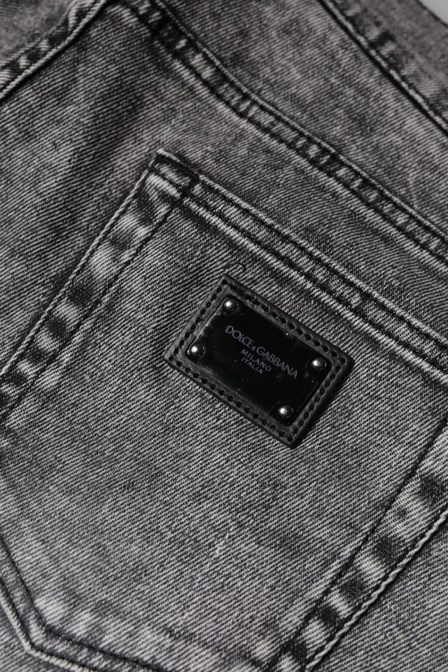 Dolce &amp; Gabbana – Slim Fit-Jeans aus Baumwolle mit Logo-Schild in Grau