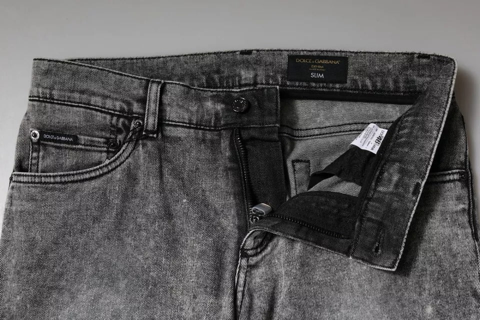 Dolce &amp; Gabbana – Slim Fit-Jeans aus Baumwolle mit Logo-Schild in Grau