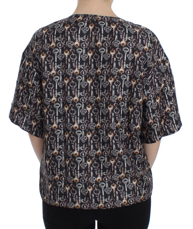 Dolce &amp; Gabbana – Seidenbluse mit grauem Gold-Schlüsseldruck