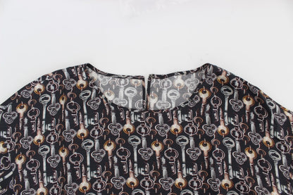 Dolce &amp; Gabbana – Seidenbluse mit grauem Gold-Schlüsseldruck