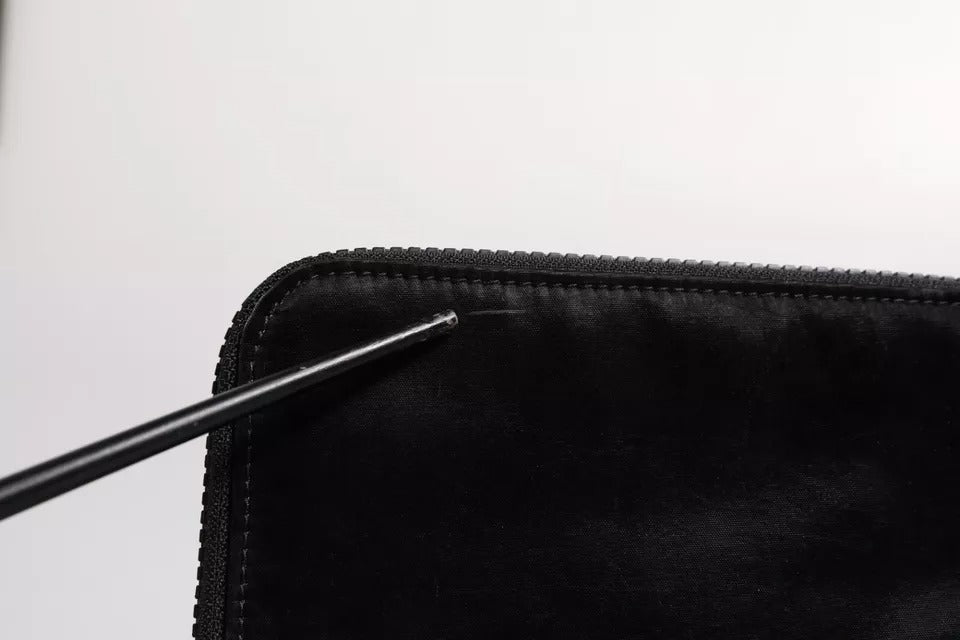 Dolce &amp; Gabbana – Schwarze Clutch aus Nylon mit Schlüsselanhänger und Logo-Plakette