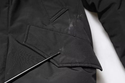 Woolrich – Schwarze, langärmlige Manteljacke aus Pelz und Lammfell mit Kapuze