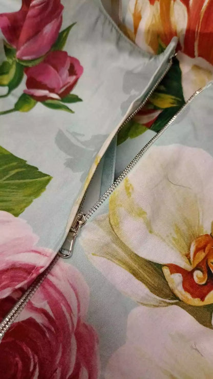 Dolce &amp; Gabbana – Grünes, geblümtes, kurzärmliges Baumwollkleid mit V-Ausschnitt