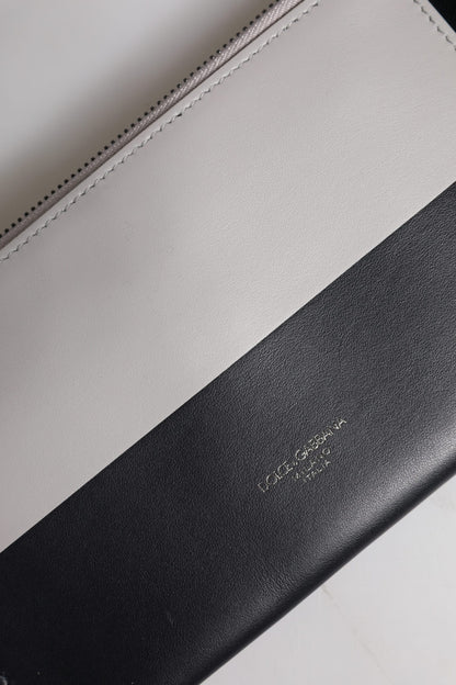 Dolce &amp; Gabbana – Umhängetasche aus schwarz-weißem Leder mit Logoprägung