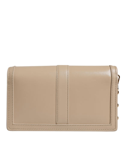 Versace – Umhängetasche aus Kalbsleder mit goldener Kette in Beige