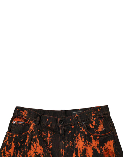 Dolce &amp; Gabbana – Gerade Jeans aus Baumwolle mit Batikmuster in Schwarz und Rot