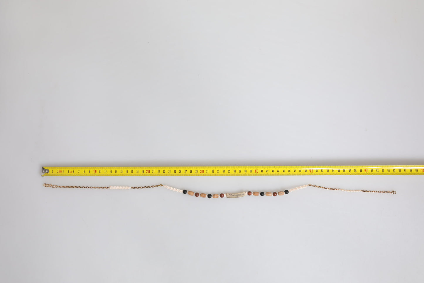 Dolce &amp; Gabbana – Halskette mit Logoanhänger aus Holzperlen in Schwarz und Gold