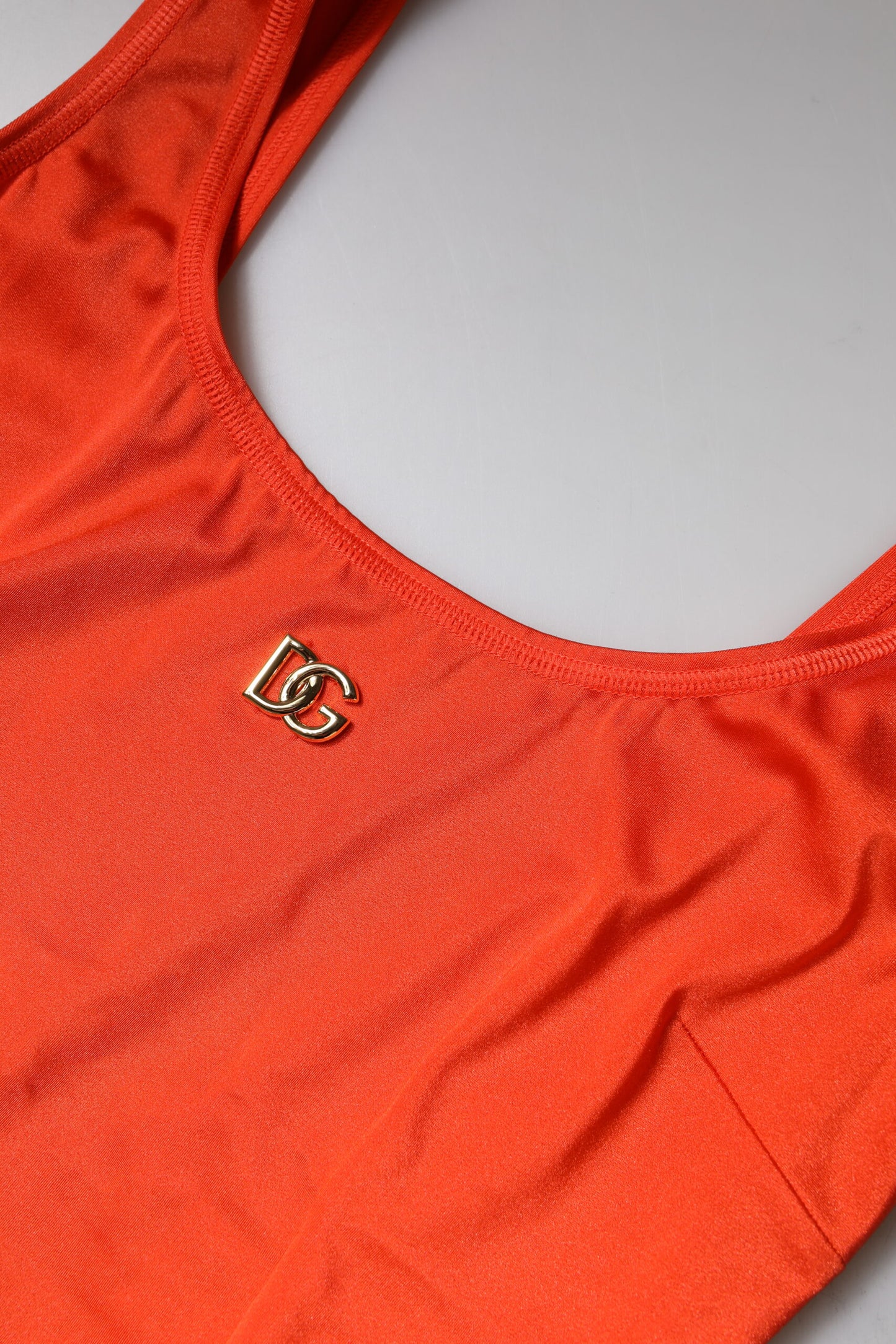 Dolce &amp; Gabbana, orangefarbenes, ärmelloses, figurbetontes Jumpsuit-Kleid