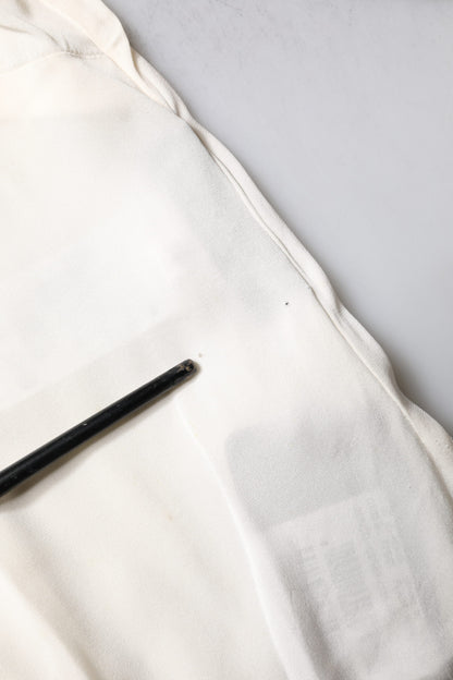 Dolce &amp; Gabbana – Cremefarbenes Blusenoberteil mit Blumenspitze und langen Ärmeln