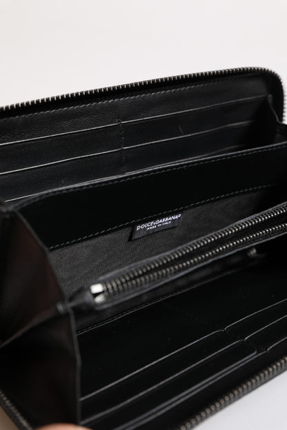 Dolce &amp; Gabbana – Kontinentale Geldbörse aus exotischem Leder mit Prägung in Schwarz und Blau