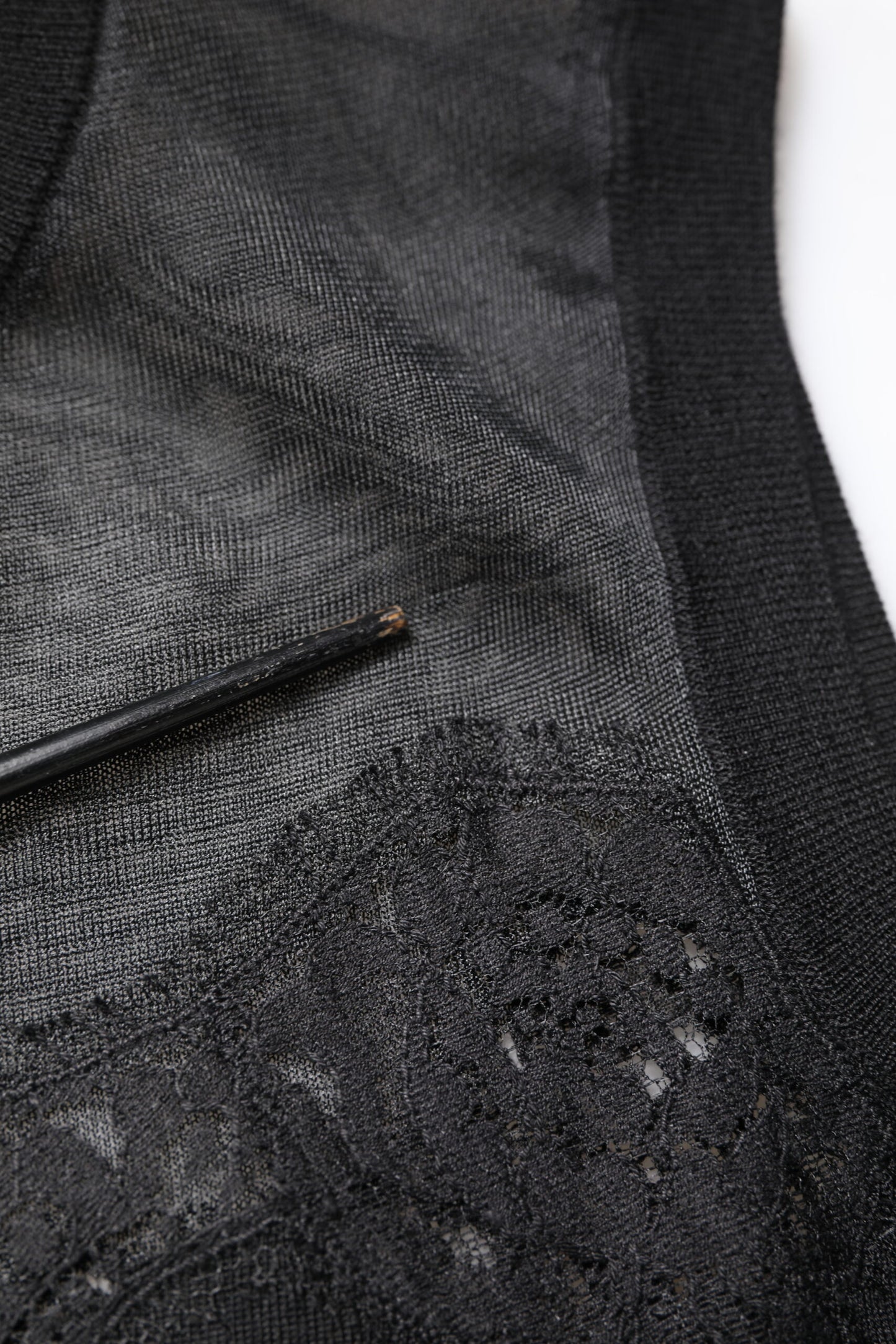 Dolce &amp; Gabbana – Ärmelloses Top mit Rundhalsausschnitt und transparenter Spitze in Schwarz