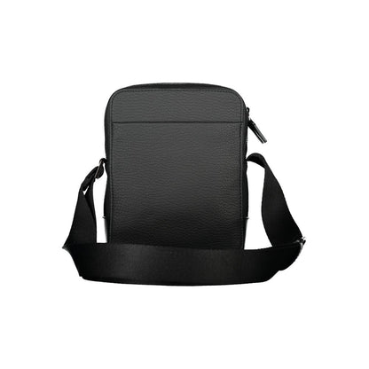Calvin Klein – Elegante schwarze Umhängetasche mit kontrastierenden Details