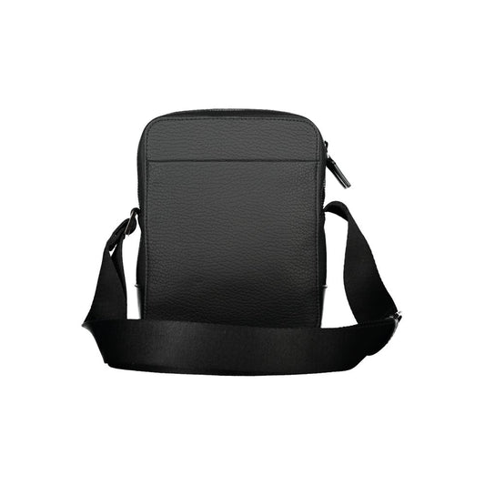 Calvin Klein – Elegante schwarze Umhängetasche mit kontrastierenden Details