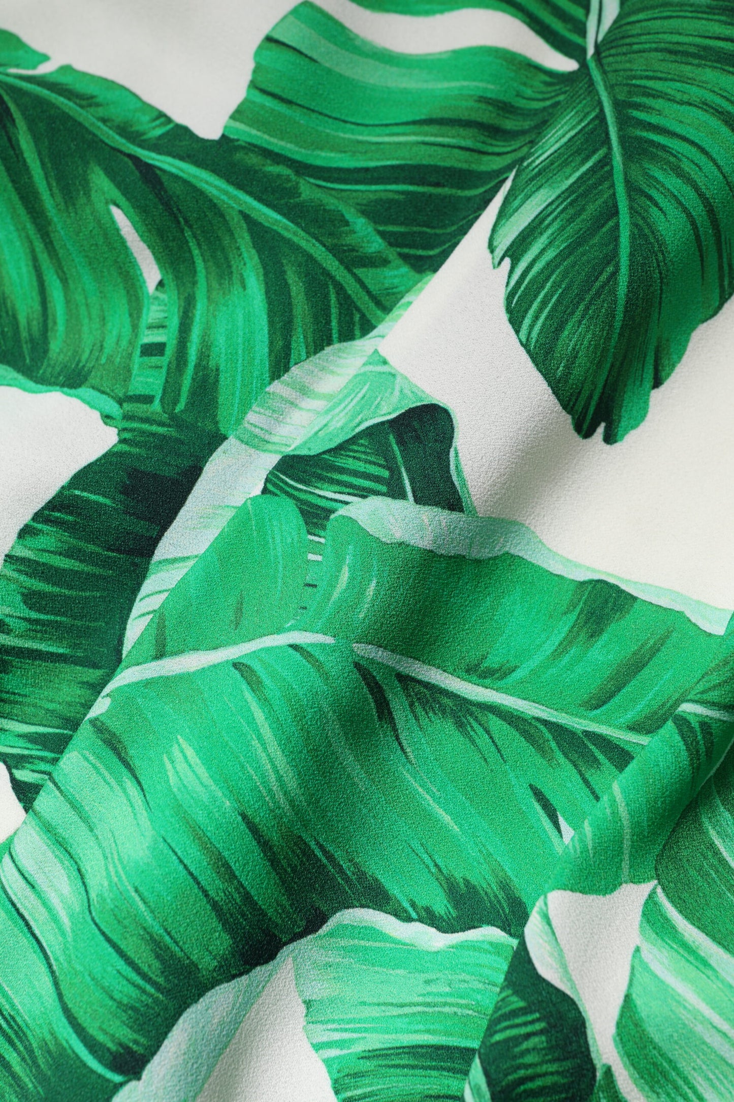 Dolce &amp; Gabbana – Weiße Hose mit grünem Blattmuster und hoher Taille