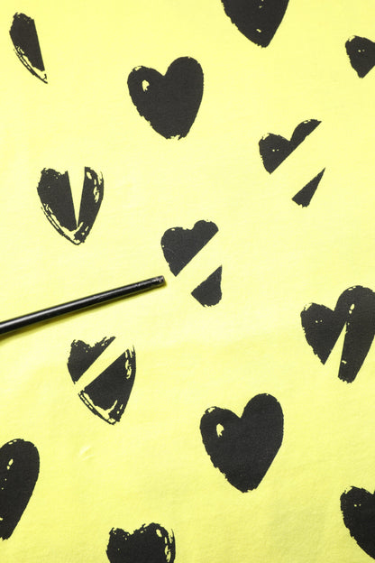 Dolce &amp; Gabbana – Ärmelloses T-Shirt aus gelber Baumwolle mit DG-Herz