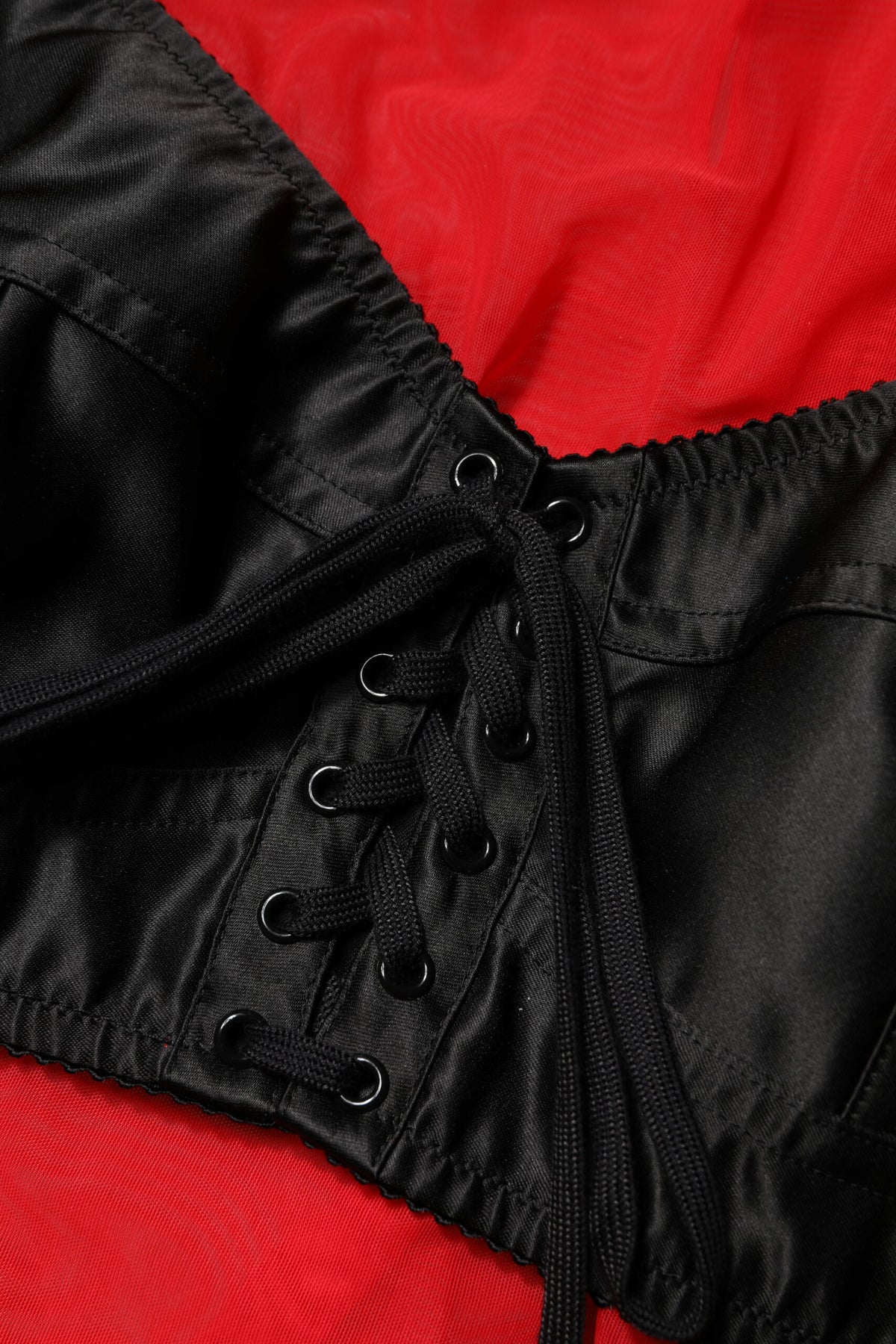 Dolce &amp; Gabbana – Rot-schwarzes Oberteil mit langen Ärmeln und Bustier-Detail