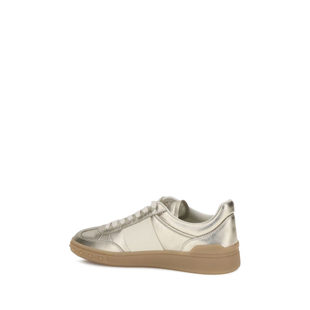 Valentino Garavani Goldene Kalbsleder-Sneaker Bos Taurus mit niedrigem Schaft