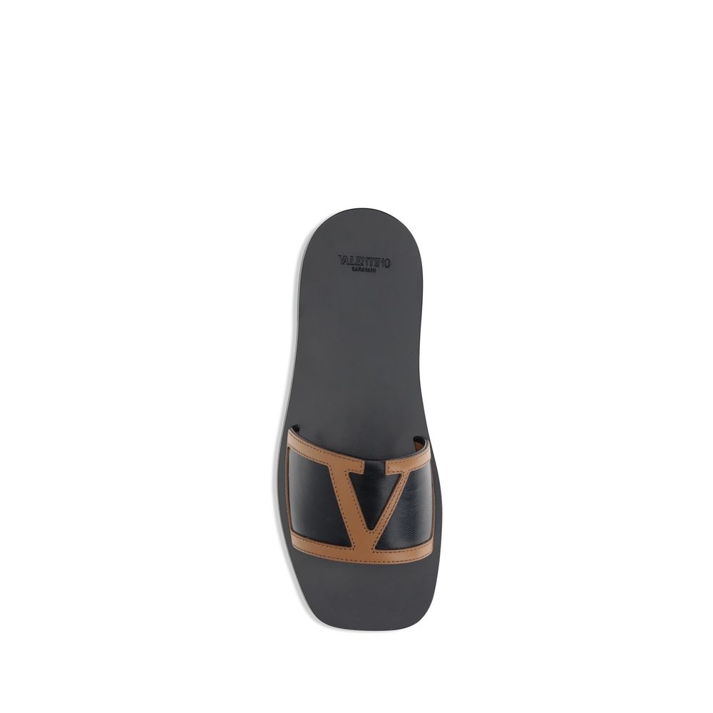 Valentino Garavani Schwarze Kalbsleder-Sandalen Modell Bos Taurus