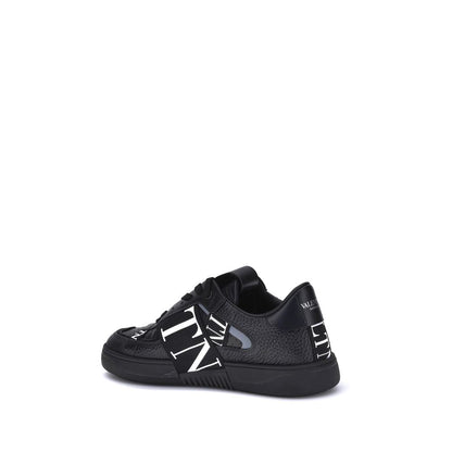 Valentino Garavani Schwarze Gummi-Sneaker mit niedrigem Schaft
