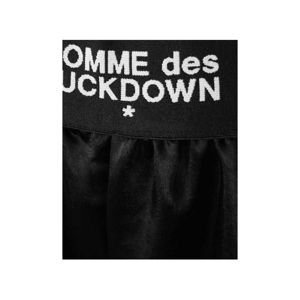 Comme Des Fuckdown – Schwarze Polyester-Shorts