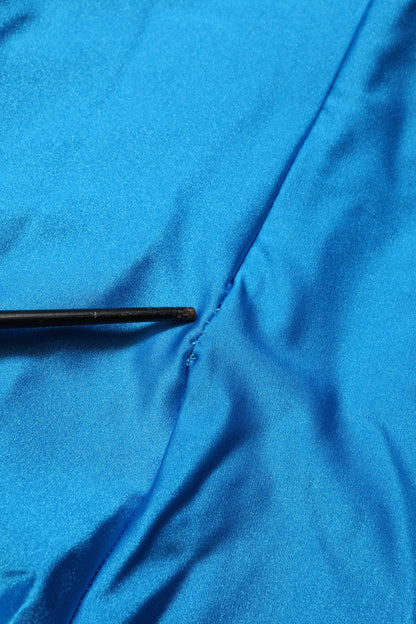 Dolce &amp; Gabbana, blaues, figurbetontes Jumpsuit-Kleid aus Nylon mit Rollkragen