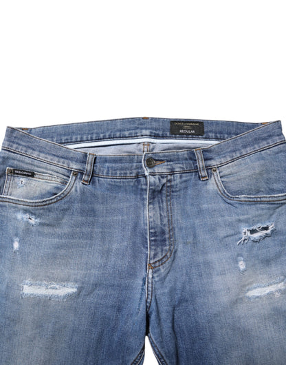 Dolce &amp; Gabbana – Blau verwaschene, zerfetzte Jeans mit Logo-Plakette