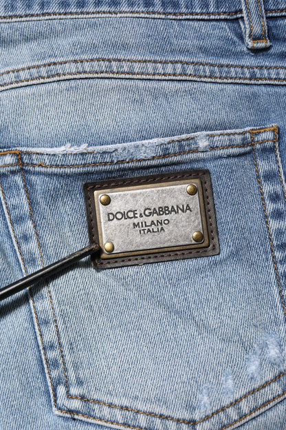 Dolce &amp; Gabbana – Blau verwaschene, zerfetzte Jeans mit Logo-Plakette