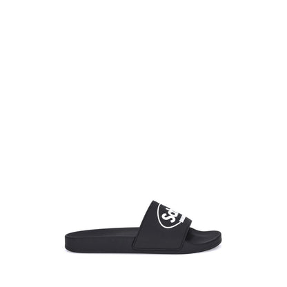 Balenciaga Schwarze flache Gummisandalen