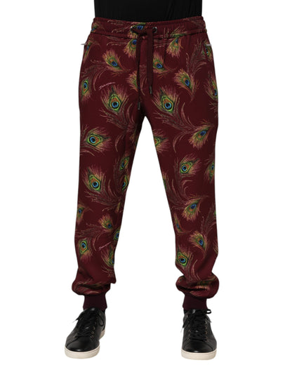 Dolce &amp; Gabbana – Jogginghose mit Pfauenfeder-Print in Burgunderrot