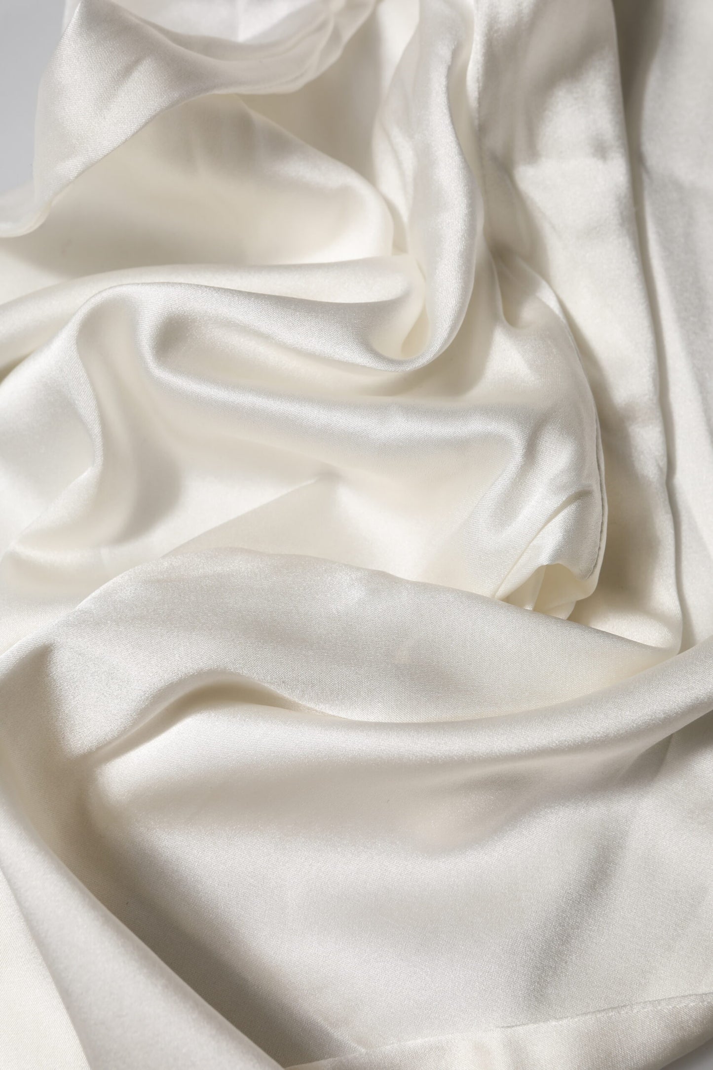 Dolce &amp; Gabbana – Konische Hose aus elfenbeinfarbener Seide mit hoher Taille