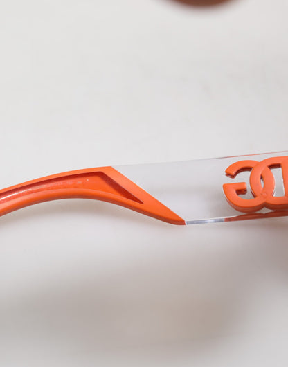 Dolce &amp; Gabbana – Orangefarbene Sonnenbrille „Reborn To Live“ mit ovalem Rahmen und Logo