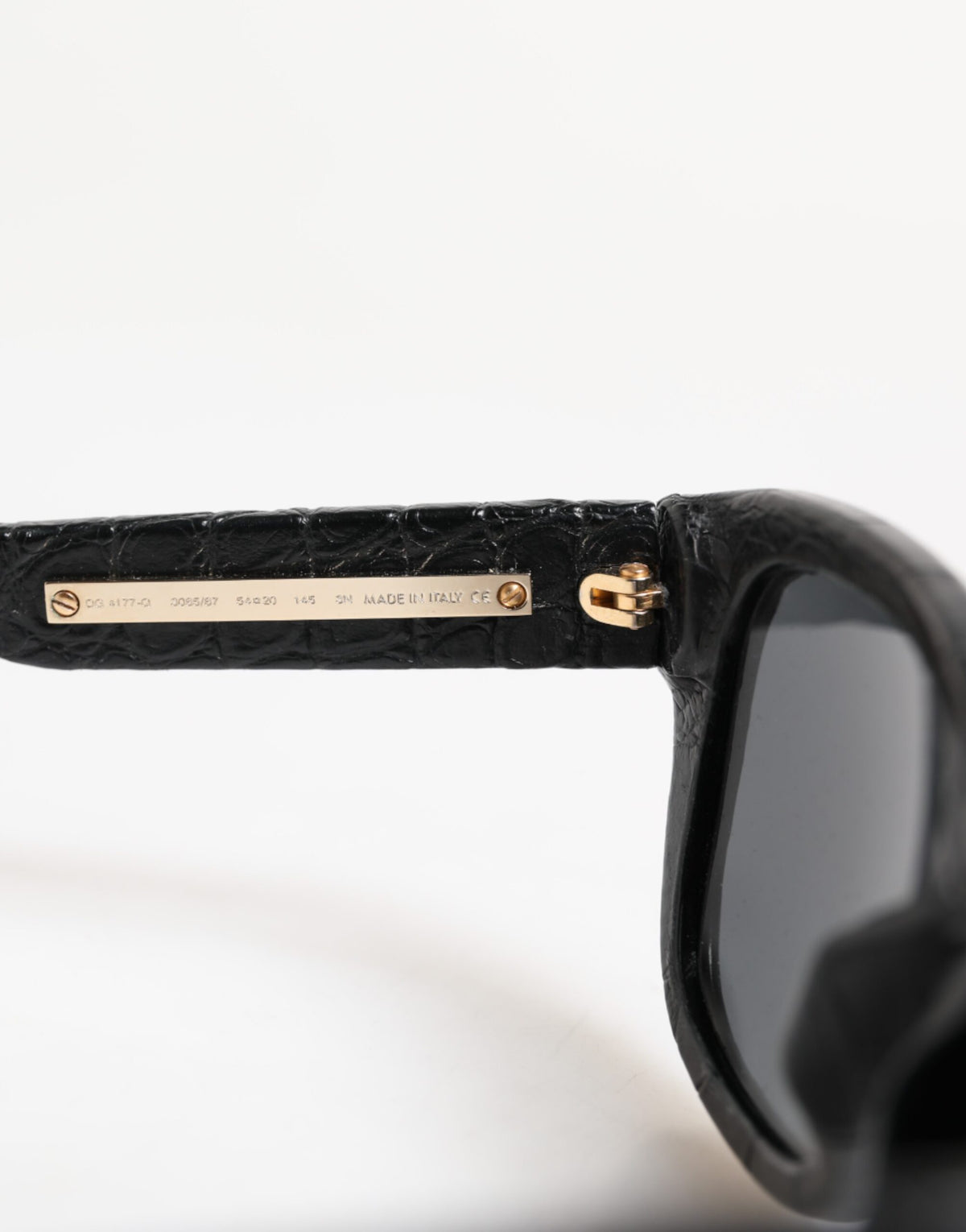 Dolce &amp; Gabbana – Sonnenbrille mit getönten Gläsern und schwarzem Lederrahmen DG4177
