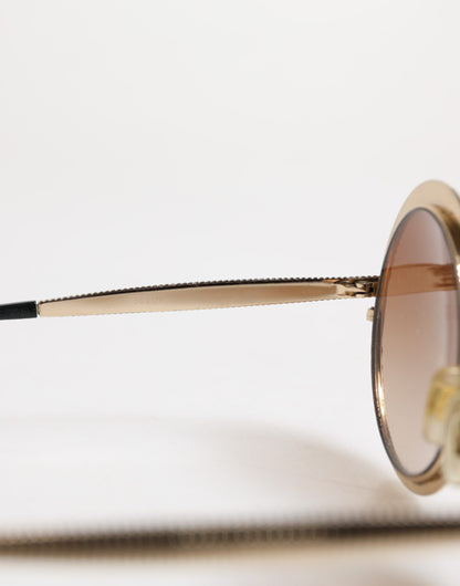 Dolce &amp; Gabbana Sonnenbrille mit rundem Rahmen in Goldbraun mit Farbverlauf DG2179